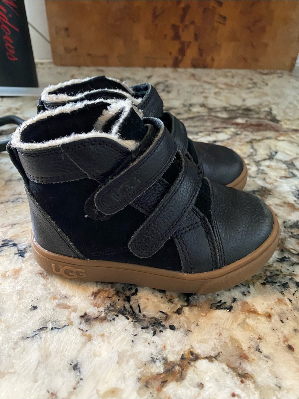 UGG Kids Black High-Top Velcro Boots with Brown Sole